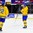 BUFFALO, NEW YORK - JANUARY 2: Sweden's Fabian Zetterlund #28 celebrates his second period goal against Slovakia with teammate Axel Jonsson Fjallby #22 during the quarterfinal round of the 2018 IIHF World Junior Championship. (Photo by Andrea Cardin/HHOF-IIHF Images)

